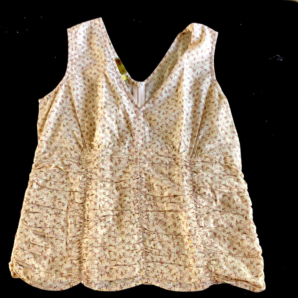 Kit Cornell printed and ruched sleeveless blouse.